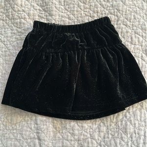 Great skirt! Goes with so many things! Size 3t black velvety w/ silver sparkle